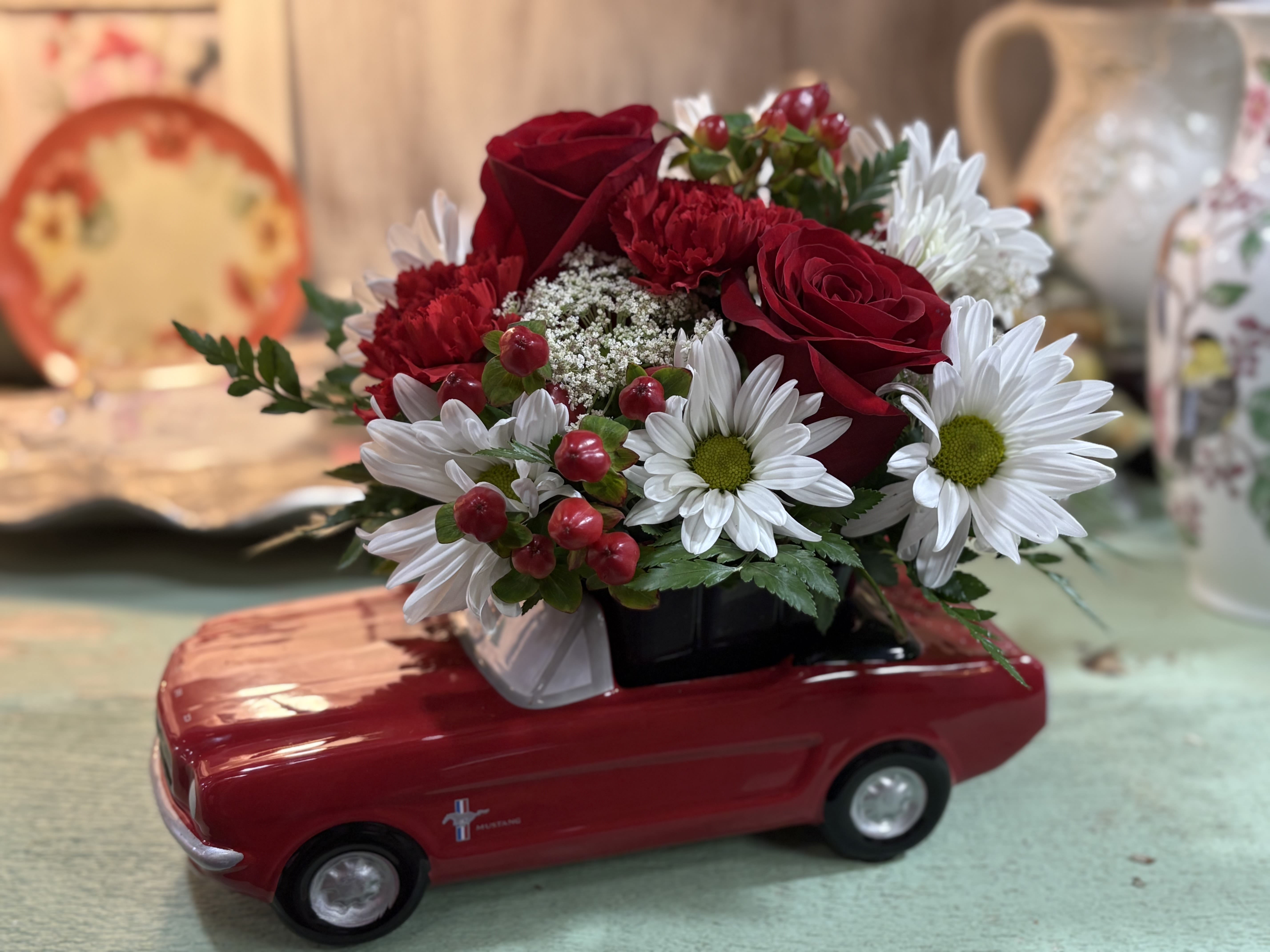 Cruisin in Red - Ceramic 65' Ford Mustang adorned with red roses and blooms for the lover of all things vintage. 