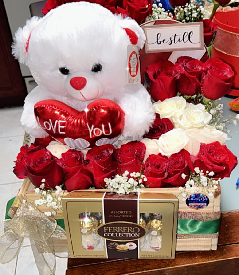 baskets roses. - baskets red roses , teddy bear, ferreira chocolates.