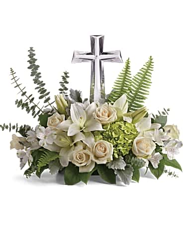 Life's Glory Bouquet - This reverant bouquet of serene white flowers is a beautiful sharing of sympathy, adorned with a majestic crystal cross keepsake. Green hydrangea, crème roses, white asiatic lilies, and white alstroemeria are accented with dusty miller, sword fern, spiral eucalyptus, and lemon leaf.