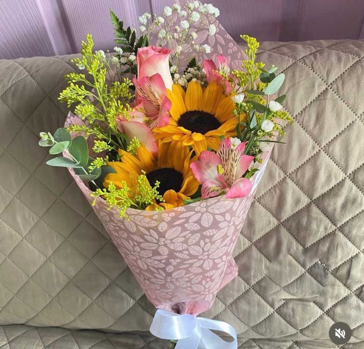 Roses and Sunflowers  - Pink Roses and Sunflowers with Alstroemeria, Eucalyptus, Solidago, and Baby Breath in a Wrapped Bouquet. Paper and flower color may vary depending on availability 