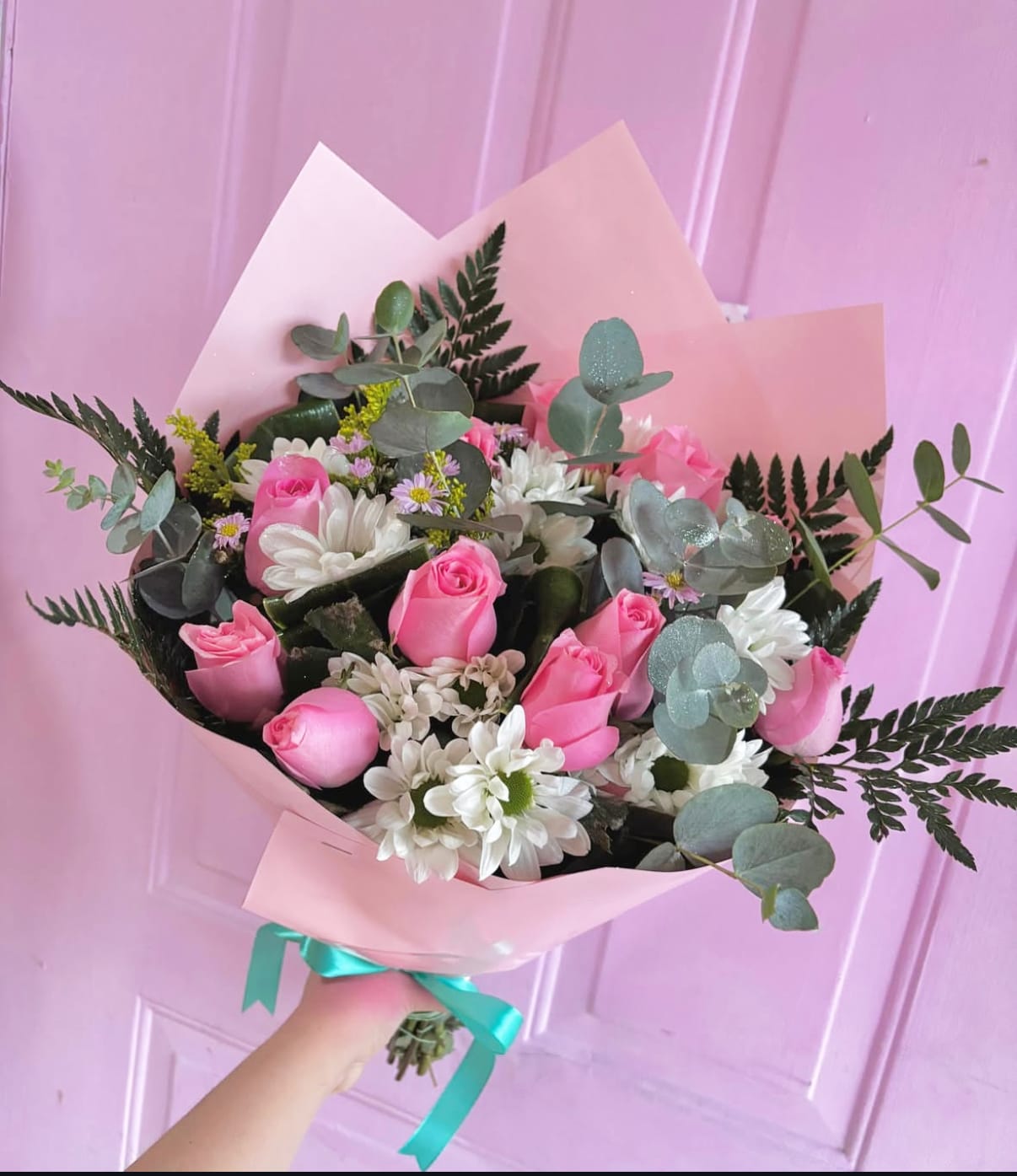 10 Pink Roses Arranged - 10 Pink Roses Arranged with White Daisies and Accents of Eucalyptus ****Paper and Flower color may vary depending on availability****