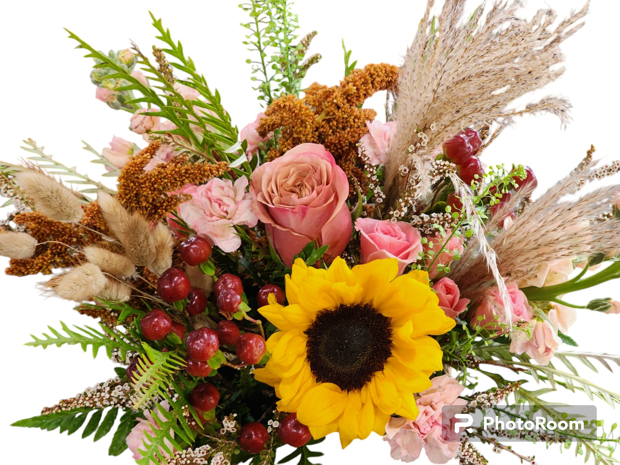 Bouquet with a sunflower, pink roses, and dried grasses