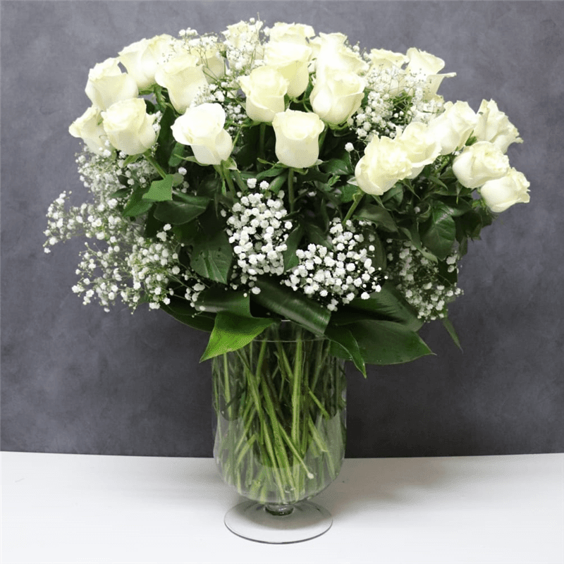 White Rose Tradition - In some instances, our photo may represent an overall theme or look and include a one-of-a-kind vase which cannot be exactly replicated.  Although the actual bouquet may not precisely match the photo, its temperament will. Occasionally, substitutions of flowers and/or containers happen due to weather, seasonality and market conditions which may affect availability. If this is the case with the gift you’ve selected, we will ensure that the style, theme and color scheme of your arrangement is preserved and will only substitute items of equal value or higher value.  If any design elements are of major importance to your order, please include them in the florist instructions at checkout or contact us to ensure availability. 