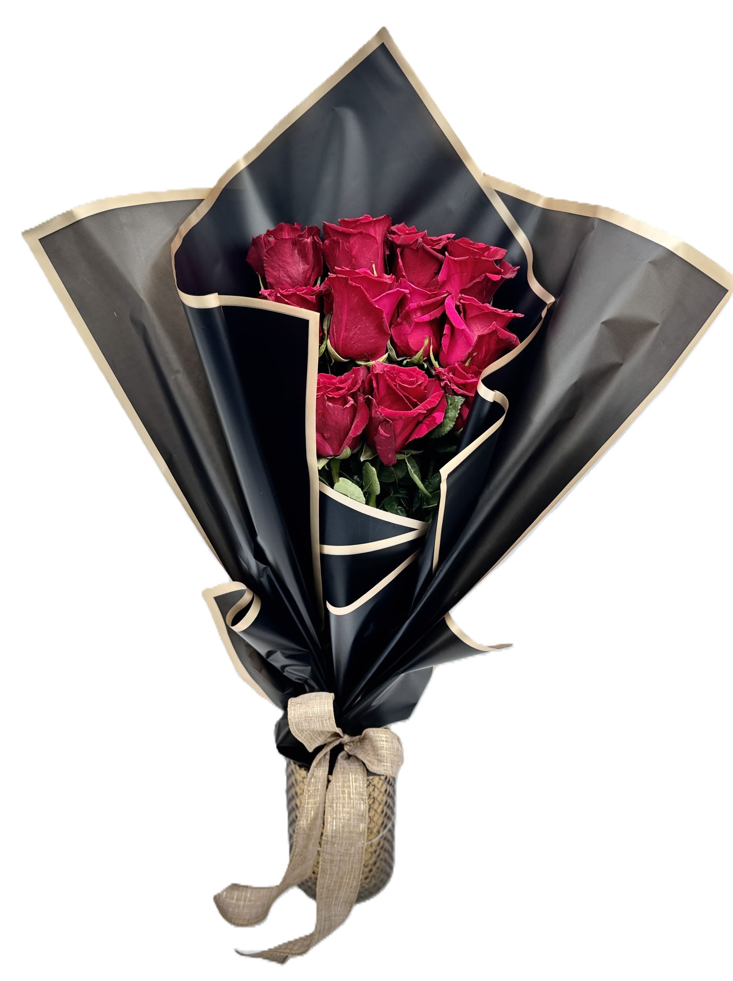 PAPER WRAPPED PRESENTATION ROSES ATENEA - Beautiful 12 Long Stem roses accompanied with varied foliage. This Bouquet will make your heart beats faster and the love feels in the air. If you want a special color please tell us in special instructions or send us a message