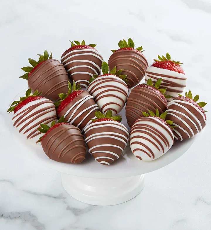 Chocolate-covered strawberries on a white pedestal stand