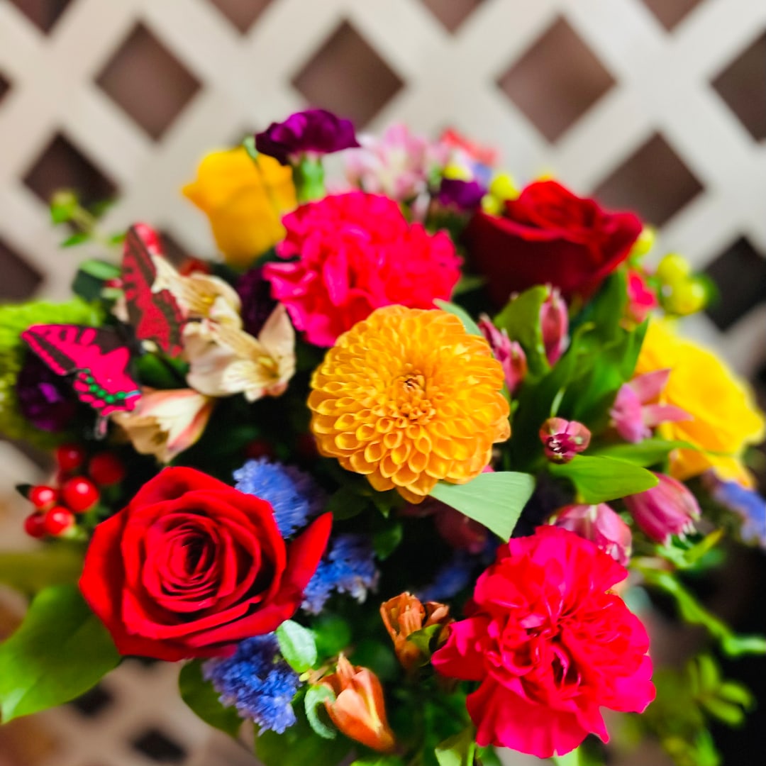 Colorful bouquet with roses, carnations, and mixed blooms