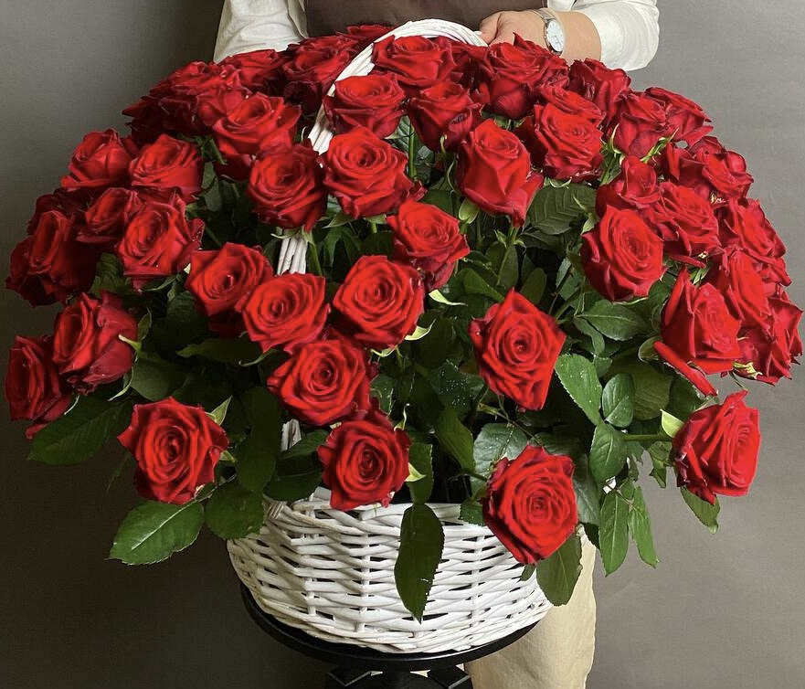 Large basket arrangement of red roses