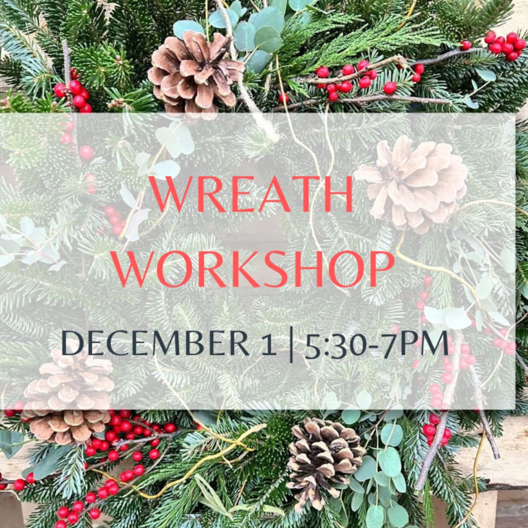 Christmas wreath with pinecones, berries, and evergreen branches