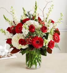 HOLIDAY VASE ARRANGEMENT - RED ROSES, HYDRANGEAS, SNAP  AND GERBERA DEISIS