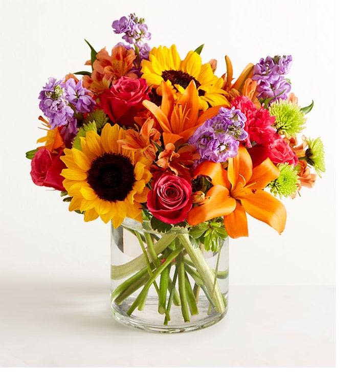 FLORAL EMBRACE - LILY, ROSES ,STOCK  AND MIX