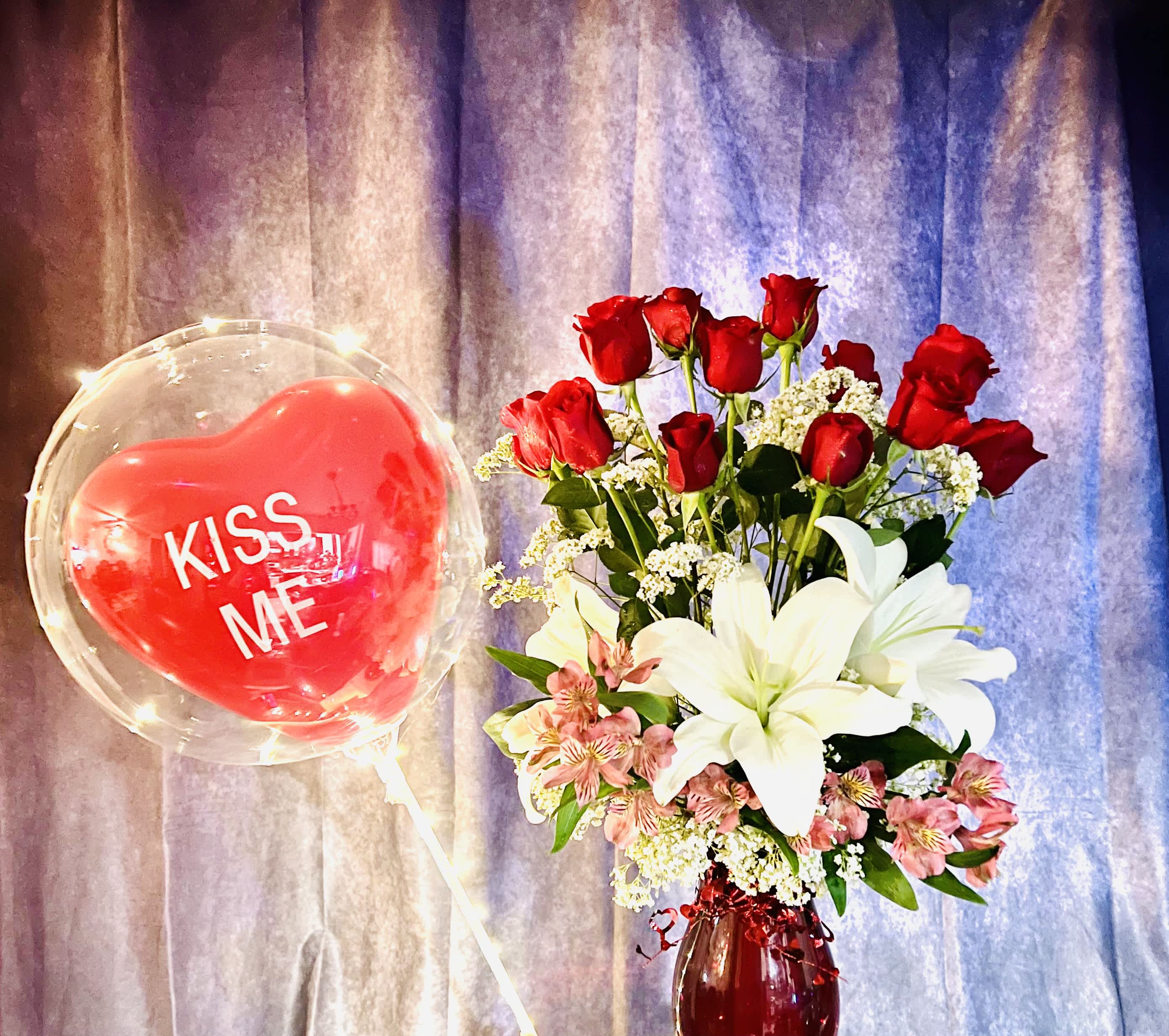 Kiss me valentine Lilies - Red roses, white Lilies bundle with kiss me red heart balloon inside bobo lighted balloon. A perfect combination to let your thoughts and love speak out for you.