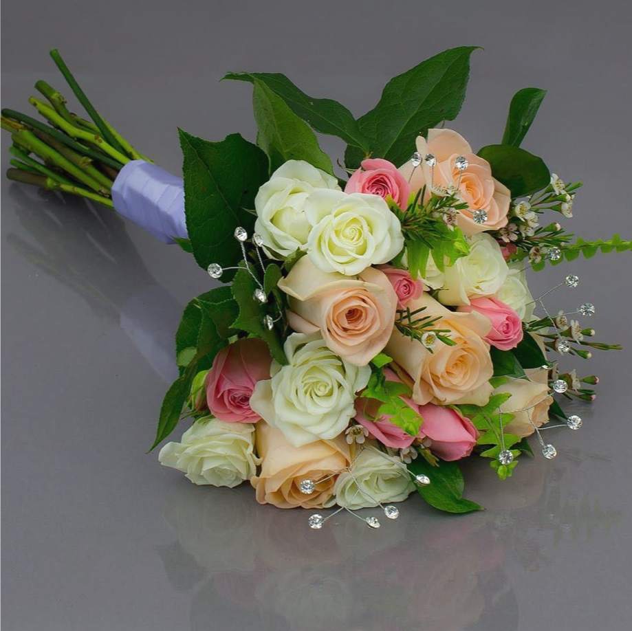 Peachy Blooms - Beautiful peachy in the mix of roses