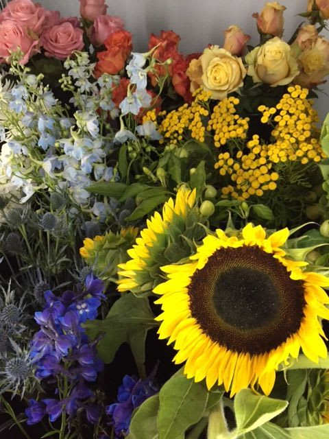 Designer's Choice  - The Designer will choose the freshest and most appropriate flowers for the occasion. You specify color preference or container choice.