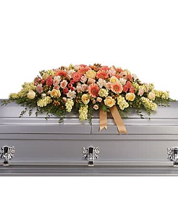 Warmest Remembrance Casket Spray - This tastefully colorful casket spray is not only a tribute to a lost loved one but a reminder of the many joyous times spent together.