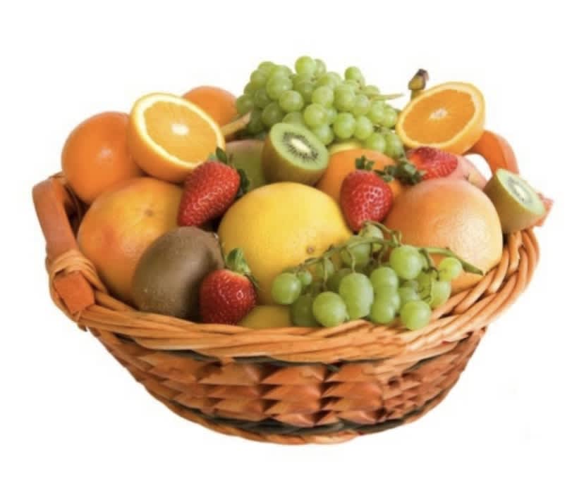 Basket of assorted fruit including oranges, grapes, strawberries, and kiwi