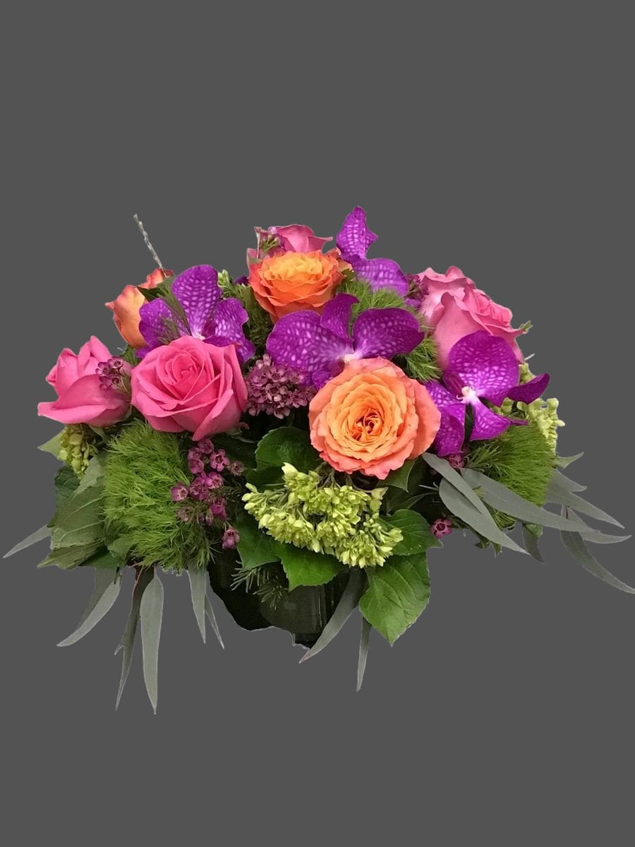 Bouquet of pink and orange roses with purple orchids