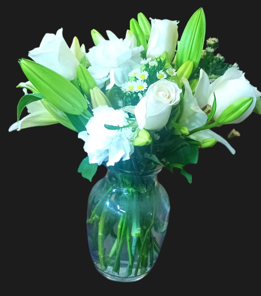 Serenity and Peace bouquet with a free vase. - This arrangement includes white roses, white asiatic lilies, white and white carnations. Send your condolences with Sweet Thoughts peace and serenity to show your loved one off. Or a birthday surprise or any occasion. This is a beautiful all white floral gift.