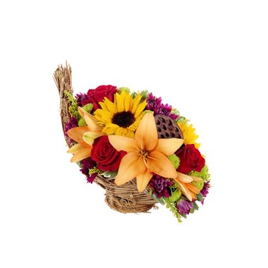 Basket arrangement with sunflowers, lilies, and red roses