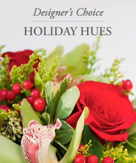 Designer's Choice Holiday Hues - It's that time of the year! Celebrate all things holly and jolly with a one-of-a-kind holiday arrangement made with the colors of the season.