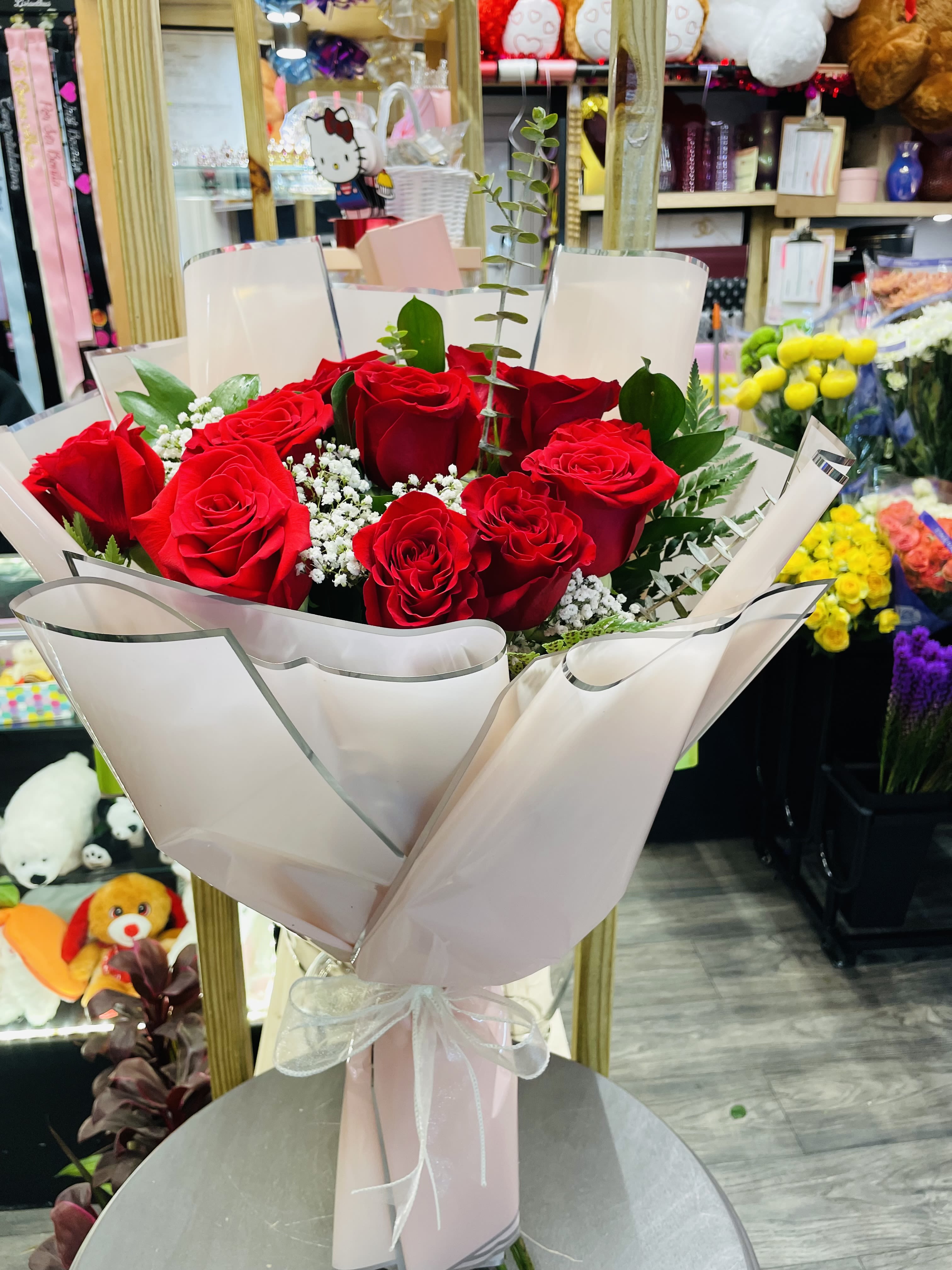 One-dozen Roses  - A classy bouquet that is perfect for any and every occasion! You could never go wrong with red roses!   *note: The bouquet does not come included with a vase!