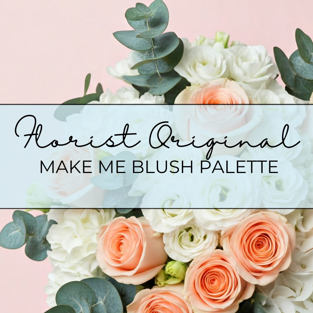 Blush and white roses with eucalyptus on a pink background