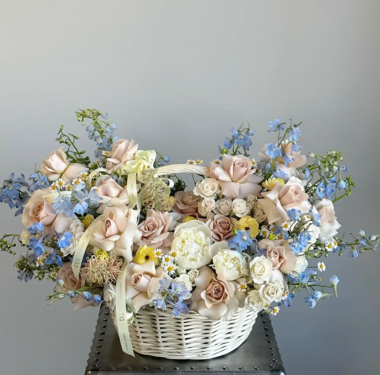 Summer  - Modern basket full of fresh summer flowers is the perfect gift for any occasion.