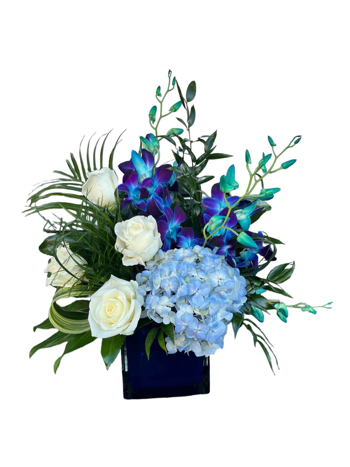 White roses and blue hydrangea in a dark vase with purple-blue orchids