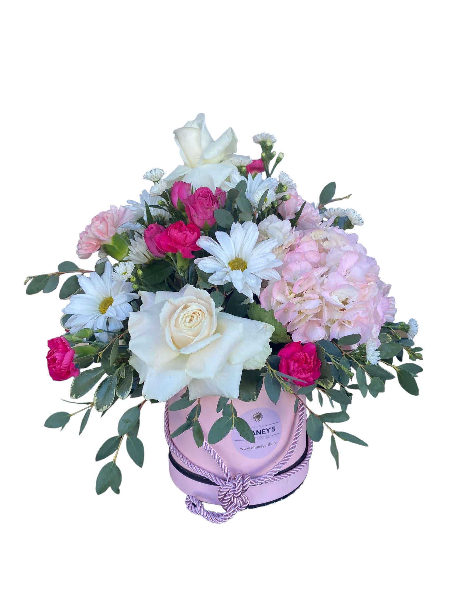 Pink and white mixed flower arrangement in a lavender hat box