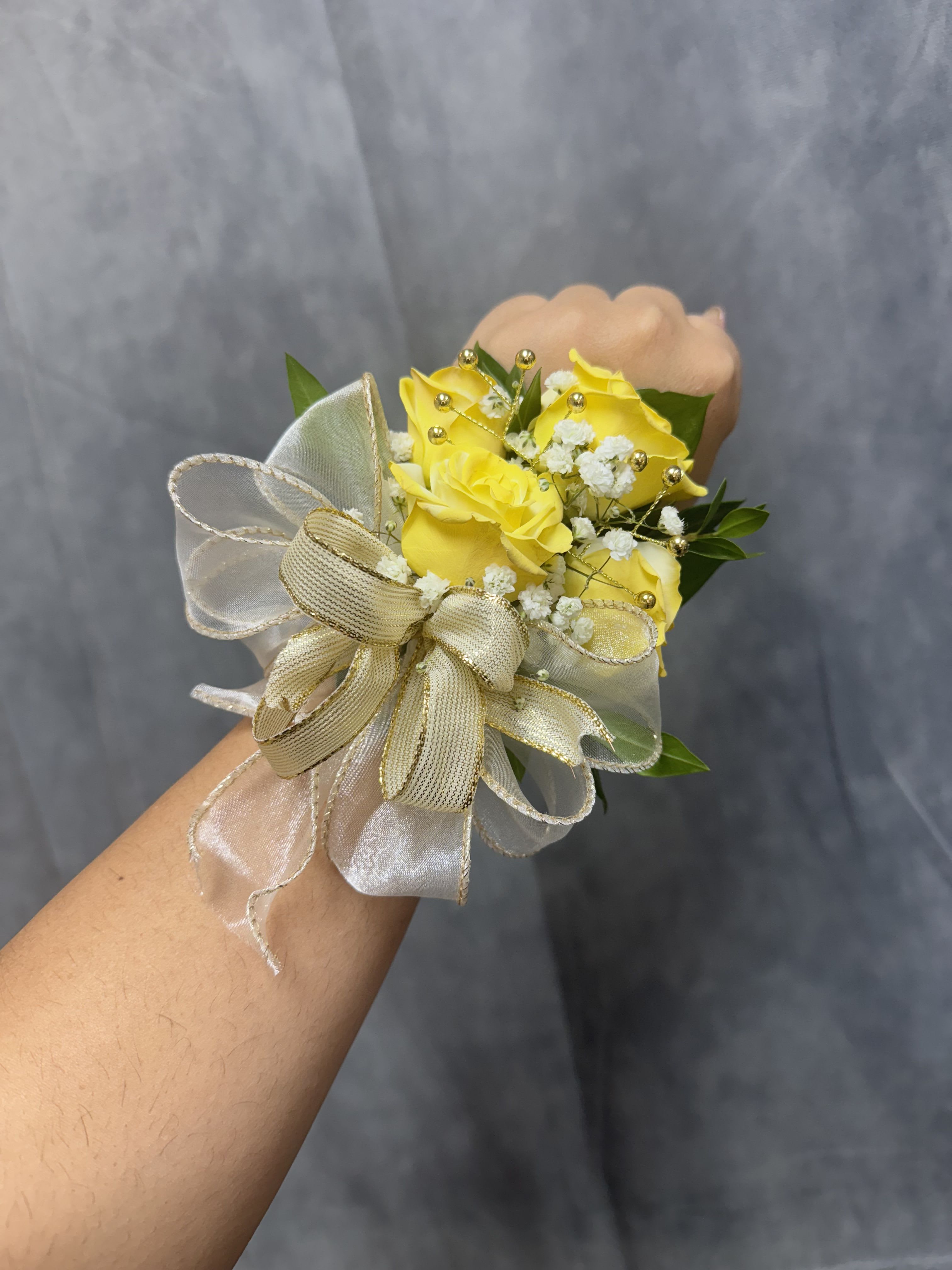 Yellow Gold spray roses wrist corsage  - Yellow spray roses with gold ribbon and gold accents wrist corsage with pearl bracelet 