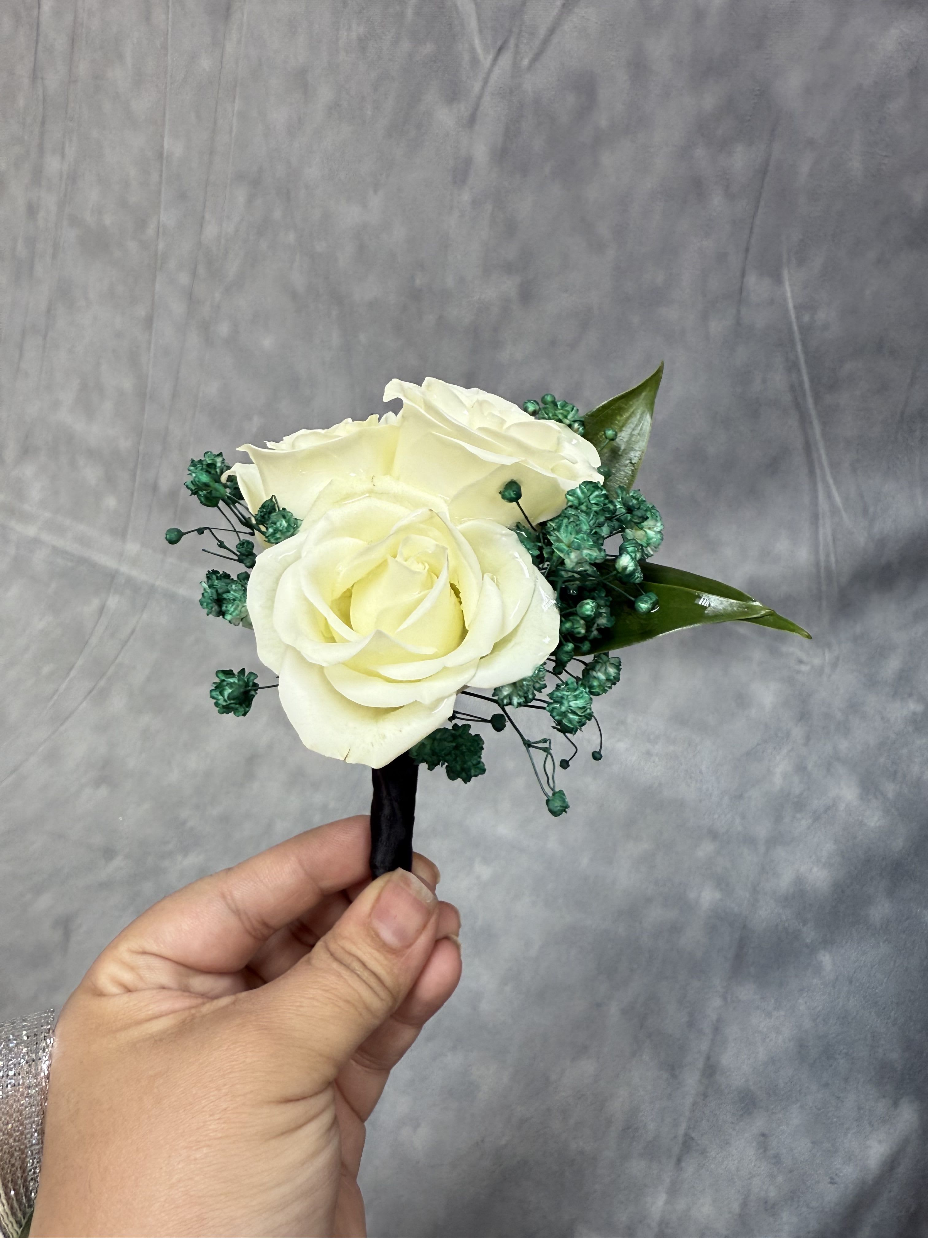 Black Green White Spray Roses Boutonnière  - White three spray roses corsage with green baby breath and black ribbon 