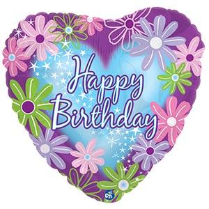 Heart-shaped birthday balloon with colorful daisy graphics and text