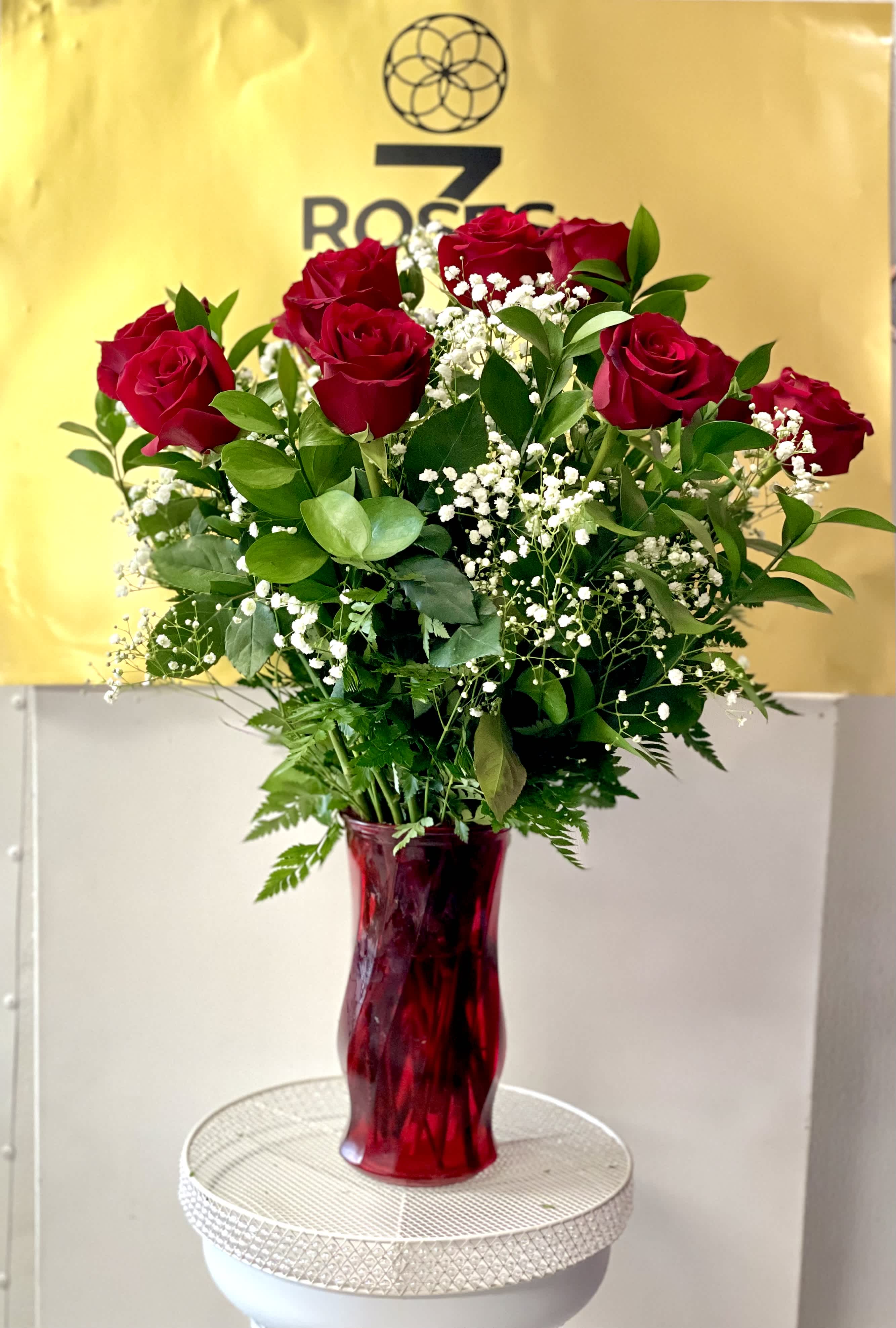 A classic rose arrangement  - Just a classic rose arrangement for different occasions.12 Roses 