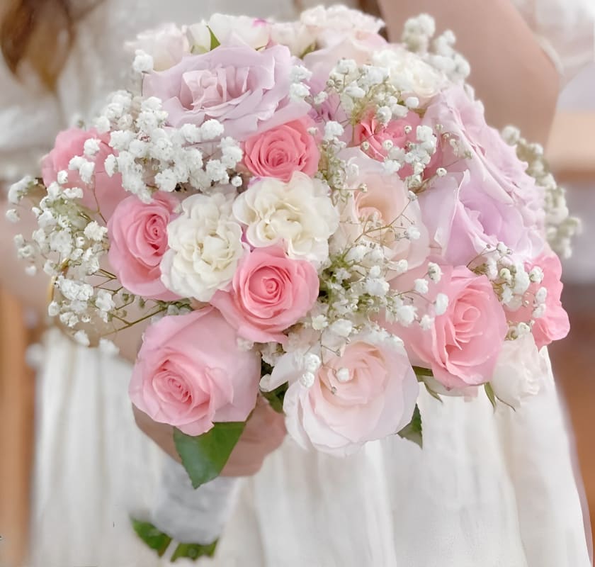 Pink and white rose bouquet with baby's breath