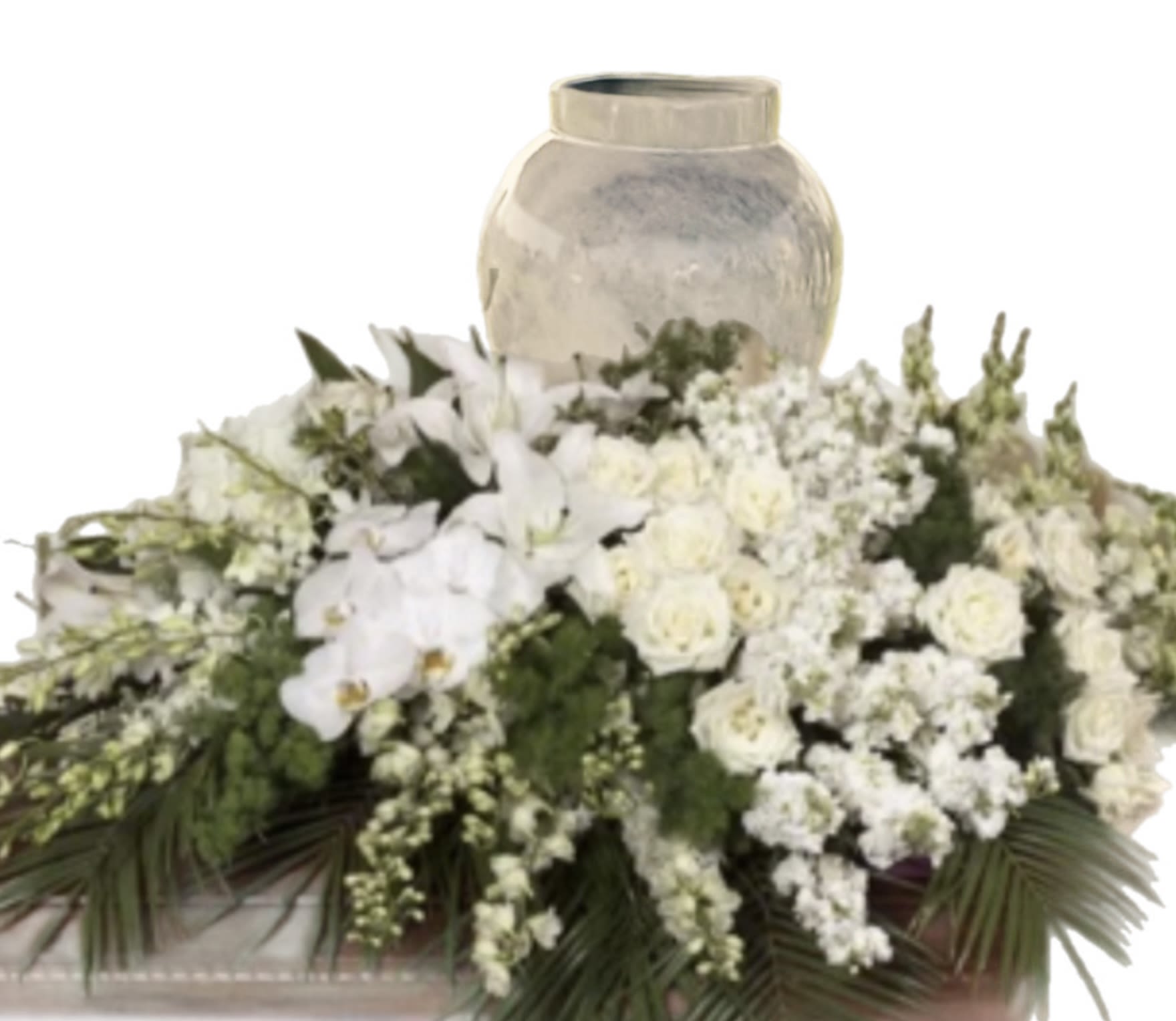 White floral arrangement with orchids and roses around a vase