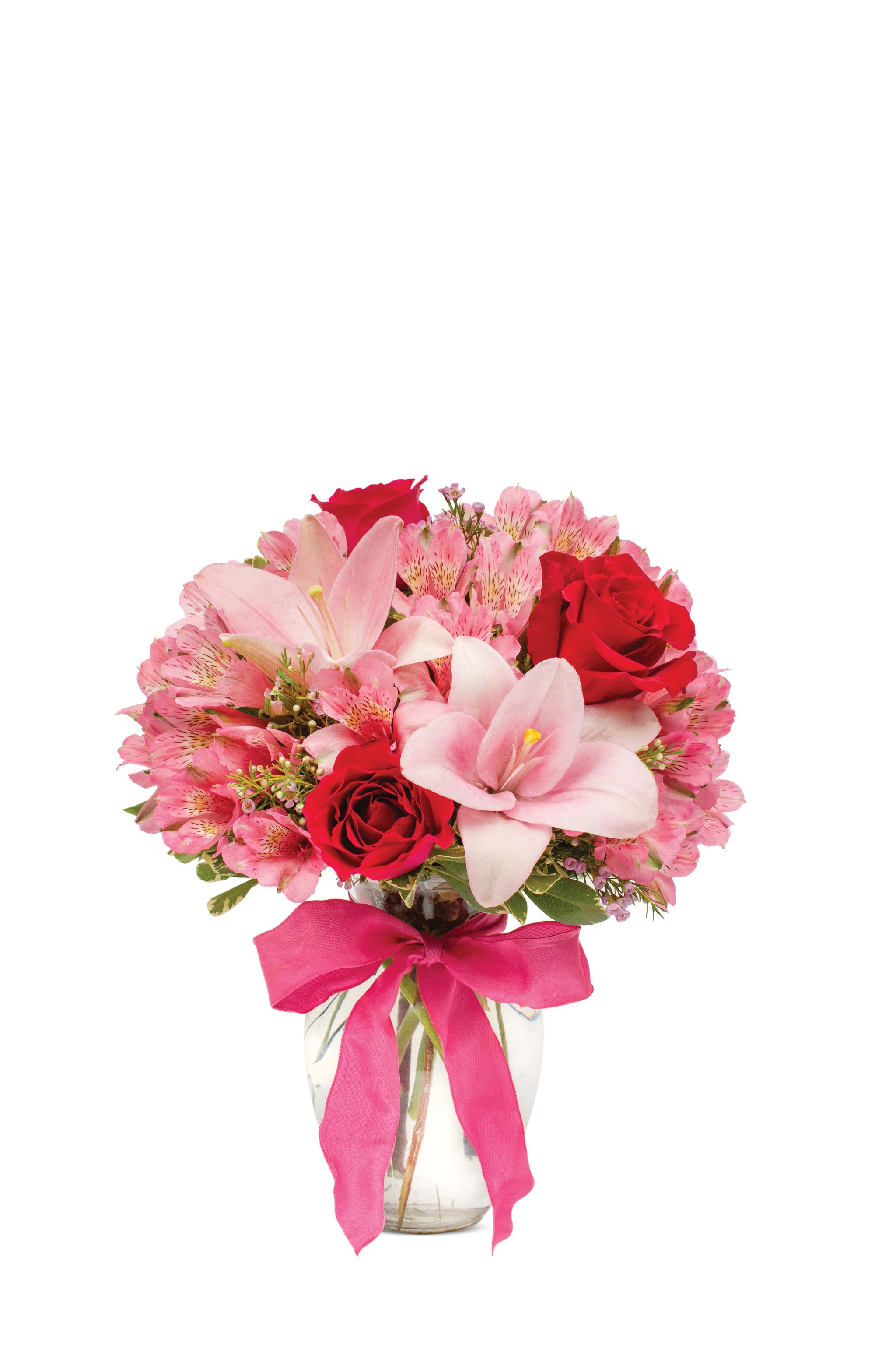European Romance Bouquet - Send stunning flowers to celebrate any occasion! With classic floral colors including red roses and pink lilies, the Rose and Lily Joy is a wonderful gift to send to a friend or family member for a birthday, get well, or anniversary. The flowers are arranged by hand at a local florist's shop. The floral artist creates the Rose and Lily bouquet with red roses, pink roses, pink lilies, pink alstroemeria, and purple waxflower. Paired with the flowers is a keepsake clear vase that is wrapped in a decorative ribbon.