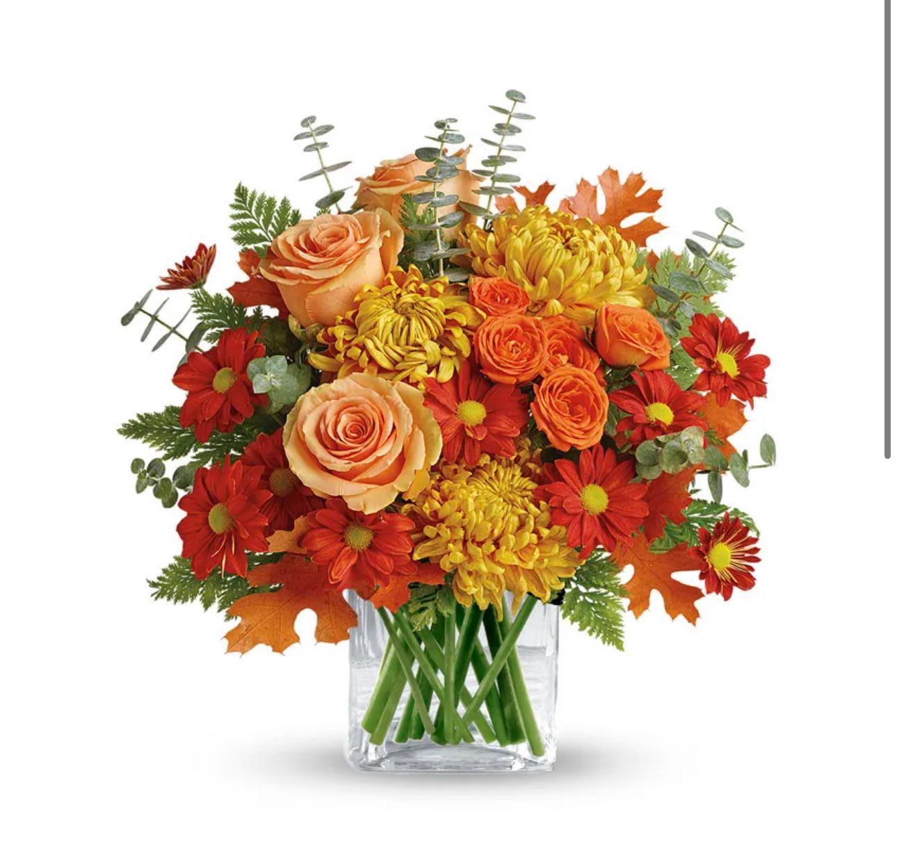 Fall Fragrance Bouquet - Brighten any space with our Fall Fragrance Bouquet — a thoughtfully designed mix of fresh, seasonal blooms presented in a balanced and elegant display. Featuring a harmonious blend of colors, textures, and flower varieties, this medium-sized arrangement is perfect for birthdays, thank-yous, get-well wishes, or everyday moments. Arranged in a classic vase or container, it’s a beautiful and versatile gift that adds warmth and charm to any room.