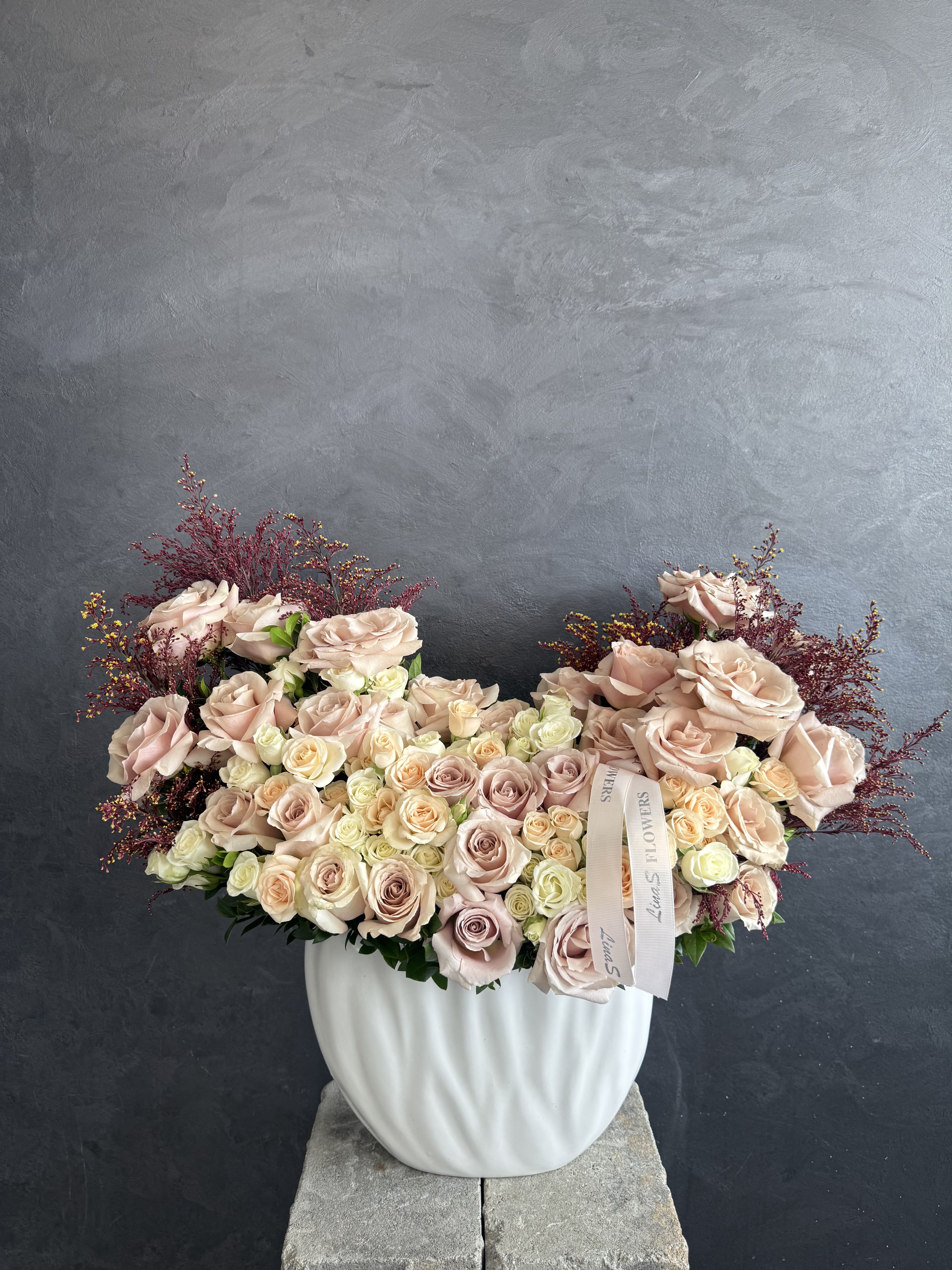 Amara - Soft blush blooms arranged with elegance and romance — a delicate mix of dreamy pastel tones creating a timeless, luxurious statement perfect for every special moment.