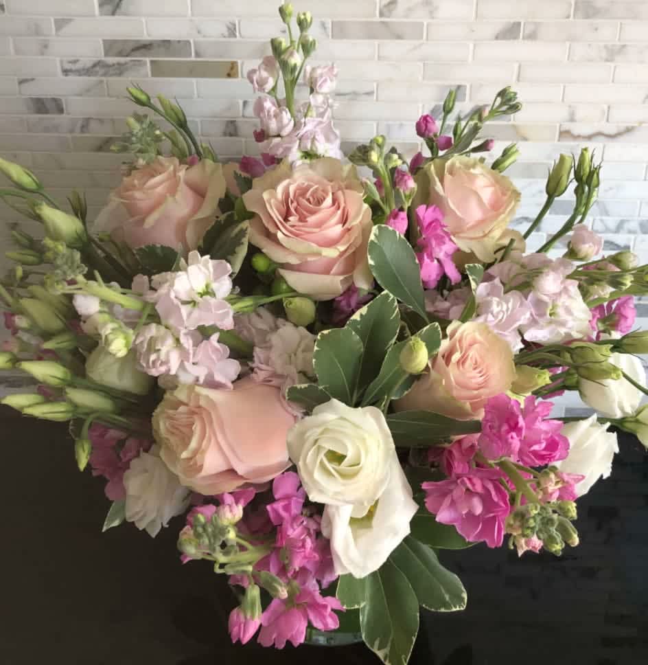 Love Knot - A romantic blend of roses, double stock and lisianthus. Whether you’re tying the knot or not!!!!