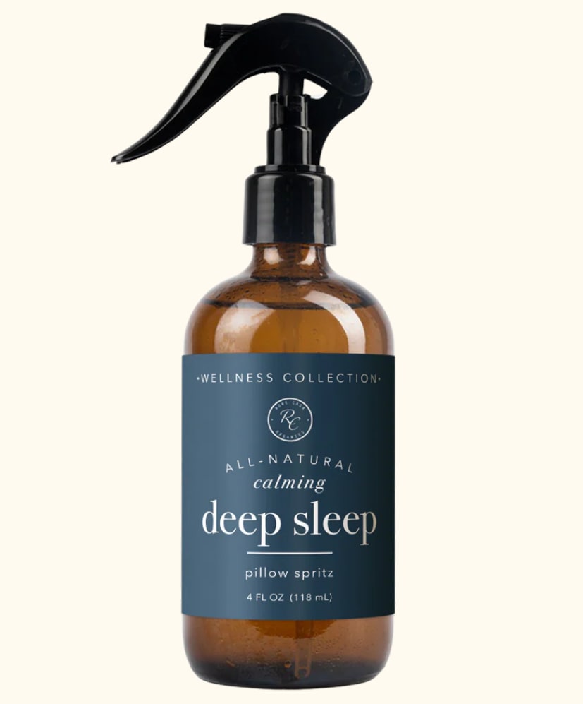 Amber spray bottle labeled deep sleep pillow spritz
