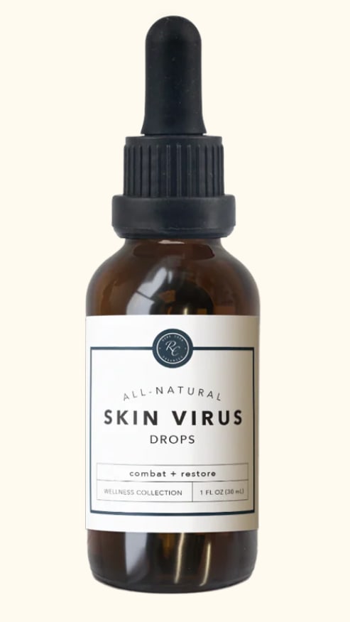 Amber dropper bottle labeled skin virus drops