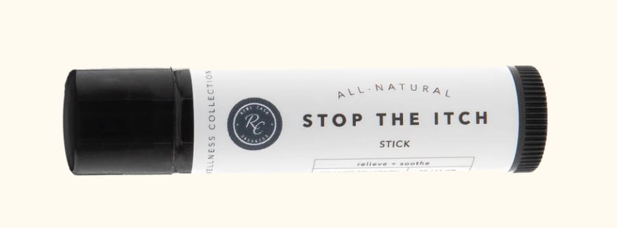 A white and black stick labeled "Stop the Itch"