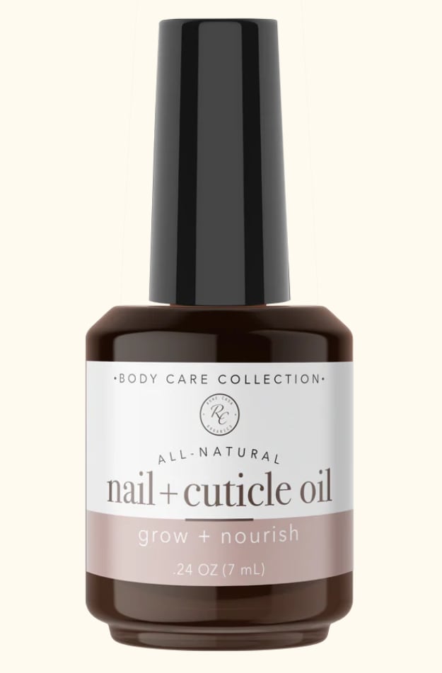 Brown bottle of nail and cuticle oil with a black cap