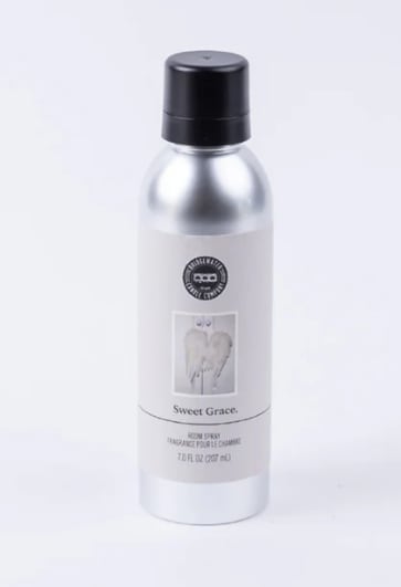 Silver room spray bottle with black cap and label