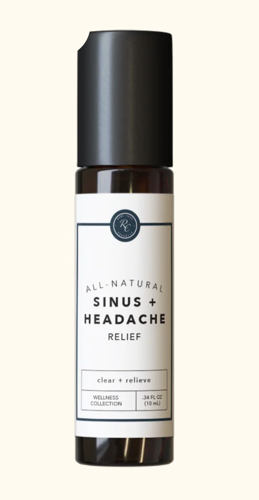 Small amber bottle labeled sinus and headache relief