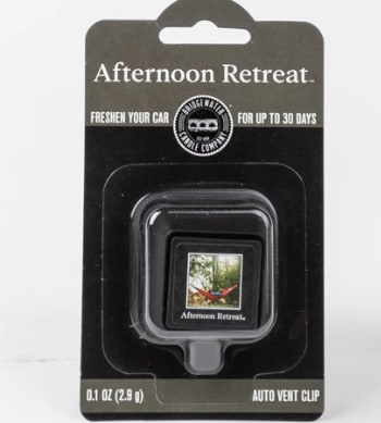 Packaged car vent clip air freshener labeled Afternoon Retreat