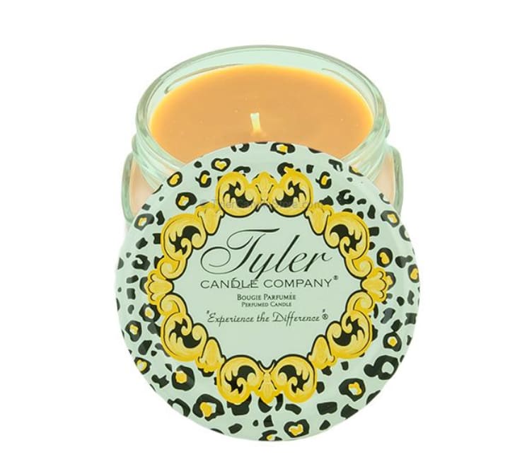 Glass jar candle with a leopard-print label
