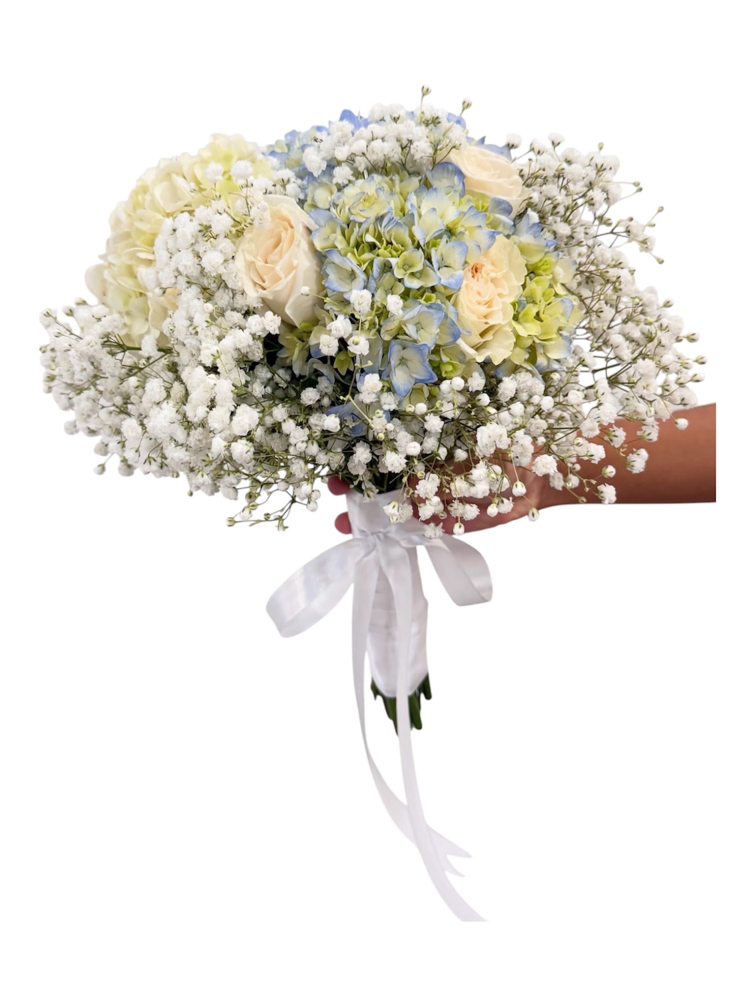 Wedding hand-tied bouquet with white baby's breath, cream roses, and blue hydrangeas wrapped in white ribbon.
