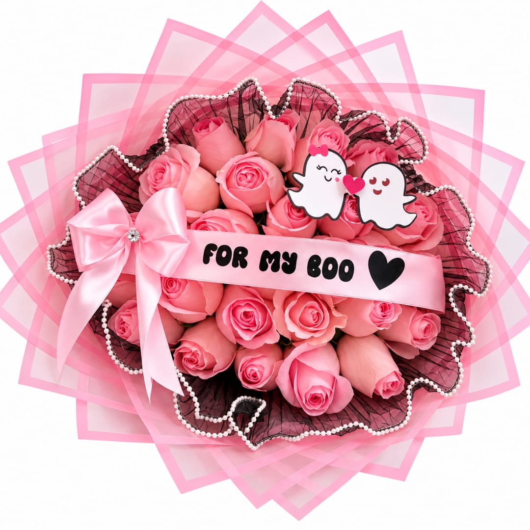 Pink rose bouquet with a satin bow and cartoon ghost toppers