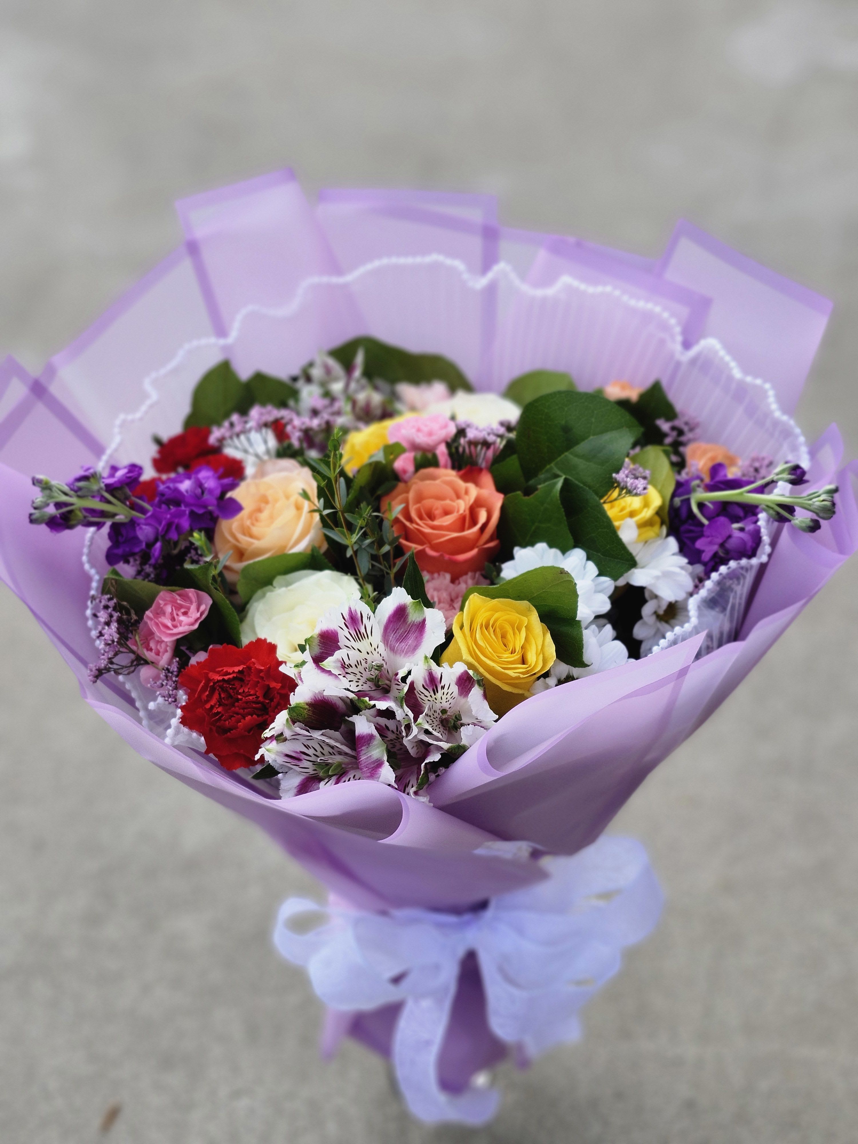 Wrap  Floral Bouquet  - Paper wrapped hand bouquet with no vase will be provided with wet foam at bottom to keep from drying.  Please take foam off and put in vase with water when at home. Change waer daily.  