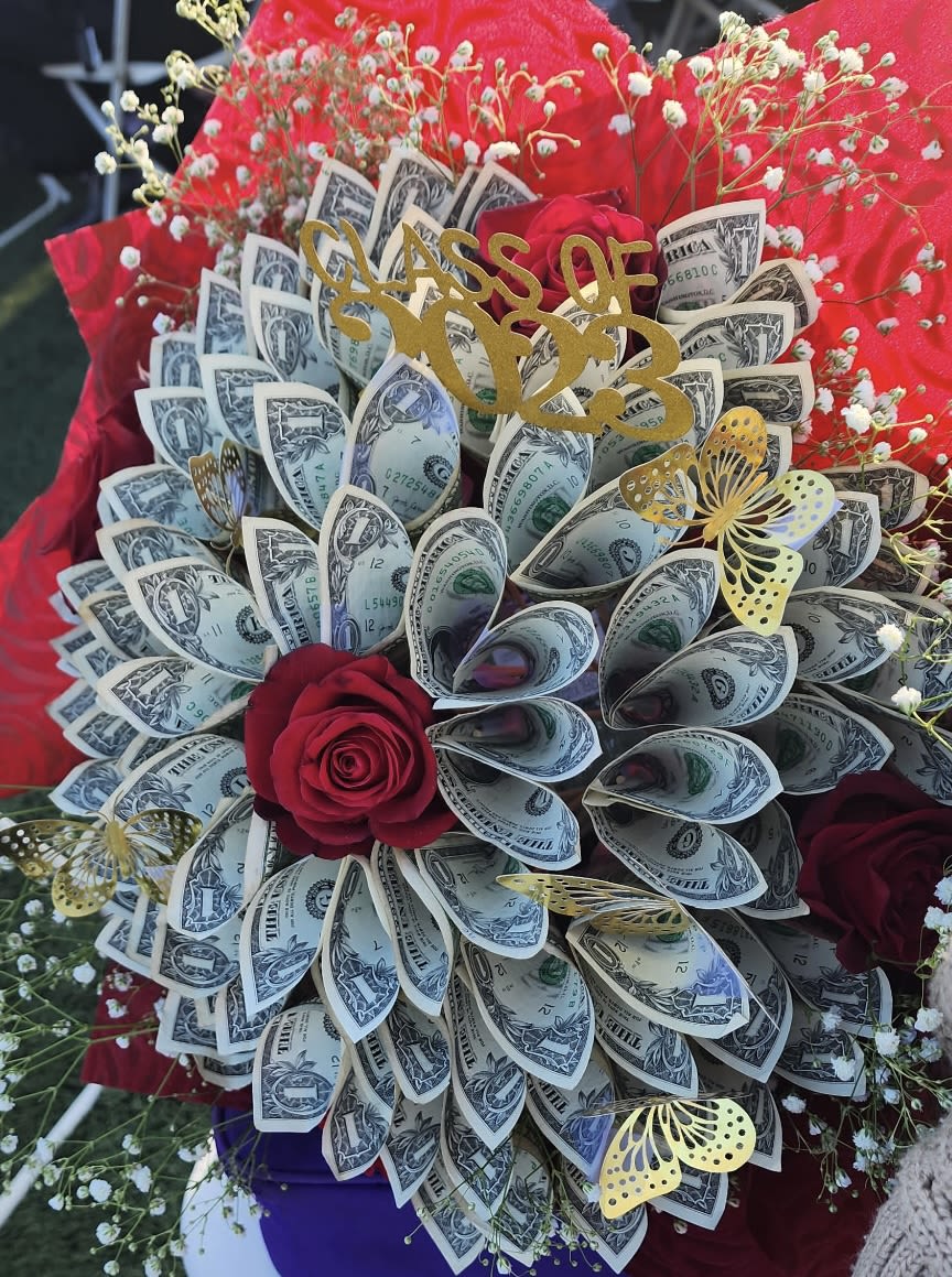 Money Bouquet - Made with real dollar bills. Processing fee is $30 not including money, floral or add ons. Please contact the store via email, phone, or text.